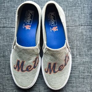Keds Gray Slip-On Sneakers with Blue Insoles and Orange Mets Script